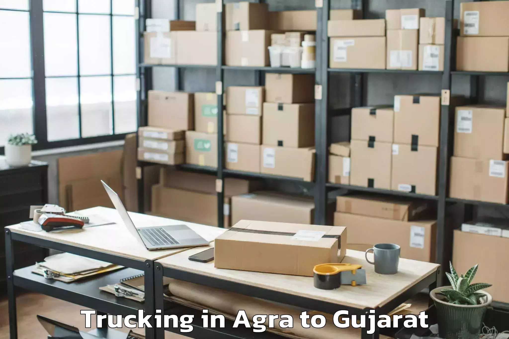 Book Agra to Navrangpura Trucking Online